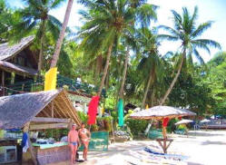 Cabanas on white sand beach